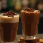 Close-up of a Baileys Irish Cream chocolate wafer cocktail.